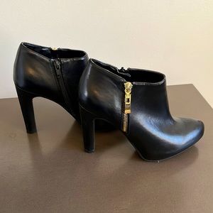 Black bootie shoes size 7 by Marc Fisher.